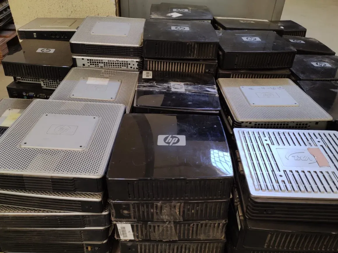 Retired desktop computers collected from corporate offices for secure recycling